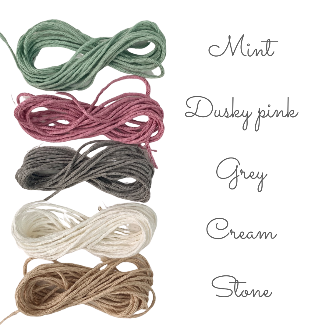 image shows the 5 colours available for the organic cotton baby bib