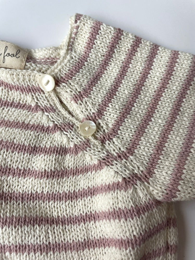 details of the organic cotton cream and pink striped baby jumper